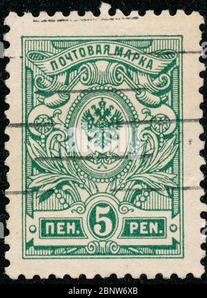 POLTAVA, UKRAINE - May 15, 2020. Vintage stamp printed in Finland circa 1915 show coat of arms of tsarist Russia Stock Photo