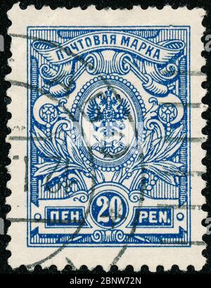 POLTAVA, UKRAINE - May 15, 2020. Vintage stamp printed in Finland circa 1915 show coat of arms of tsarist Russia Stock Photo