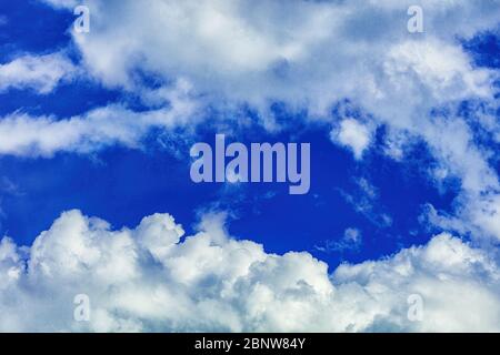Bright deep blue sky beautiful clouds and fresh air for background Stock Photo