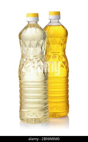 Plastic bottles of refined and  unrefined vegetable oil isolated on white Stock Photo