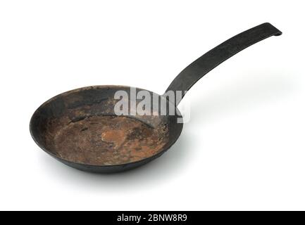 Old dirty frying pan isolated on white Stock Photo