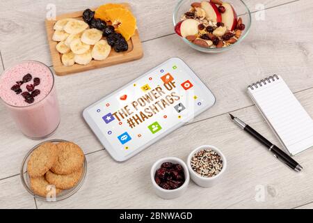 Healthy Tablet Pc compostion with THE POWER OF #HASHTAGS inscription, Social networking concept Stock Photo