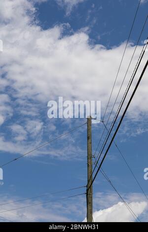 Power line isolated against the blue sky Stock Photo - Alamy