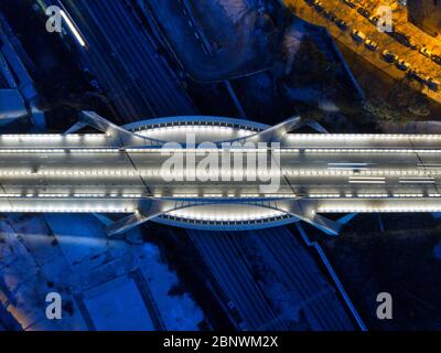 Puente Bac de Roda bridge built by Santiago Calatrava aerial view Barcelona Catalonia Spain.  The slender outline of the Bac de Roda Bridge, known loc Stock Photo