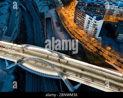 Puente Bac de Roda bridge built by Santiago Calatrava aerial view Barcelona Catalonia Spain.  The slender outline of the Bac de Roda Bridge, known loc Stock Photo