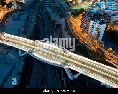 Puente Bac de Roda bridge built by Santiago Calatrava aerial view Barcelona Catalonia Spain.  The slender outline of the Bac de Roda Bridge, known loc Stock Photo