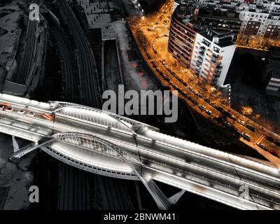 Puente Bac de Roda bridge built by Santiago Calatrava aerial view Barcelona Catalonia Spain.  The slender outline of the Bac de Roda Bridge, known loc Stock Photo