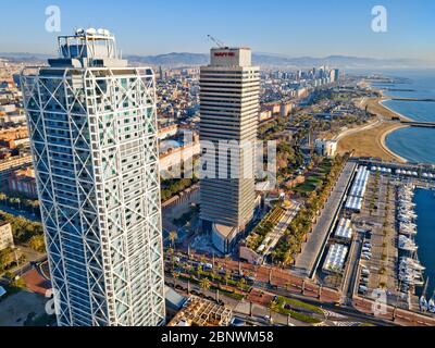 Twins towers Mapfre tower and Hotel Arts and port aerial view Barcelona Catalonia Spain.  The twin towers on the skyline of Barcelona are the Torre Ma Stock Photo