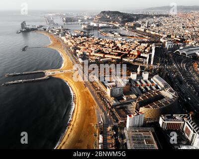 Barceloneta beach and france train station and Barcelona harbour aerial view Barcelona Catalonia Spain Stock Photo