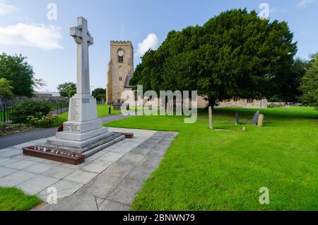 Abergele, UK: Aug 19, 2019: Abergele War Memorial in the grounds of St Michael's Church, commemorates local men who died during World War I & World Wa Stock Photo