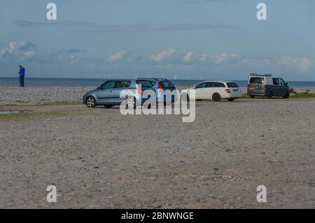 Pensarn, Abergele, UK: Aug 19, 2019: Cars parked on the seafront car parking area at Pensarn on a sunny summer day. Stock Photo