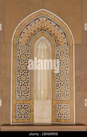 MUSCAT, OMAN - NOVEMBER 30, 2017: mosaic decorations with Islamic Indian art Mughal style in Sultan Qaboos Grand Mosque in Muscat, Oman Stock Photo