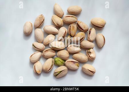 Food nut pistachios in shells roasted salted on white Stock Photo