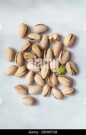 Food nut pistachios in shells roasted salted on white Stock Photo