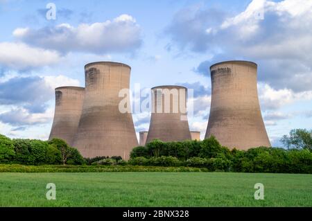 Four cooling towers of the Fiddlers Ferry power station, Warrington after closing - no steam is rising from the towers. May 2020. Stock Photo