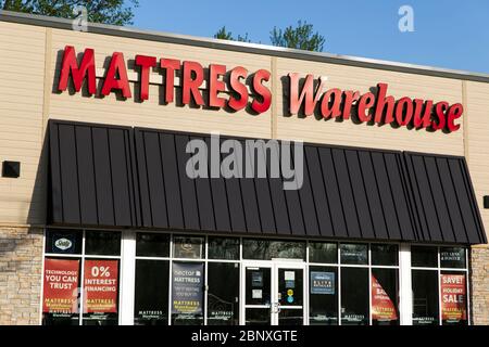 A logo sign outside of a Mattress Warehouse retail store location in Wilmington, Delaware on May 4, 2020. Stock Photo