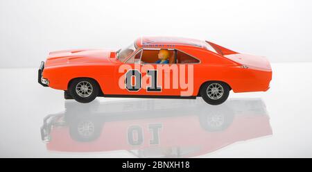 Scalextric Dukes of Hazzard slot car racing car isolated on a white background with a reflection. Stock Photo