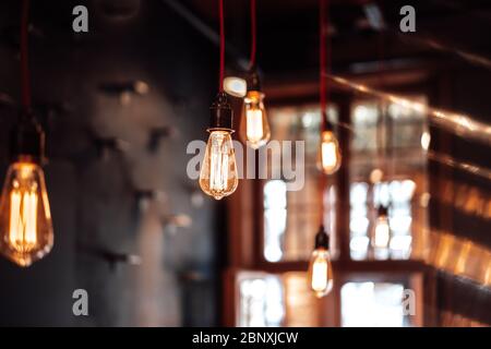 photo of modern lamps hanged from the ceiling Stock Photo
