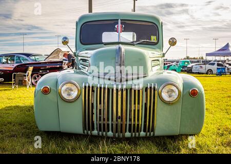 Daytona Beach, FL / USA- November 24, 2018: Green customized 1946 Ford pickup truck at the Fall 2018 Daytona Turkey Run. Stock Photo
