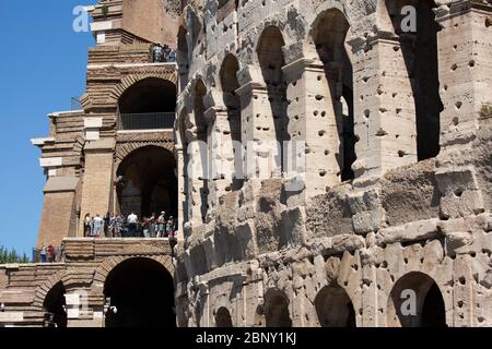 Roman colosseum in Rome city centre and the walls of Ancient Rome,Italy Stock Photo