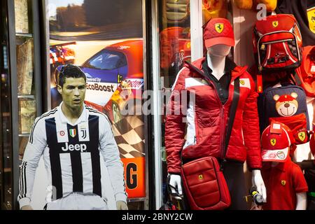 Ferrari gift shop in Rome with picture of Christiano Ronaldo in Juventus football soccer strip,Italy Stock Photo