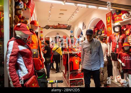 Ferrari and Qatar airways mercandise for sale at a store in Rome city centre,Italy Stock Photo