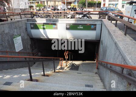 MILANO, Italy. 23 August 2019: Entrance to Udine metro station in Milan. Udine is a station on the line 2 of Milan underground, the green line. Stock Photo