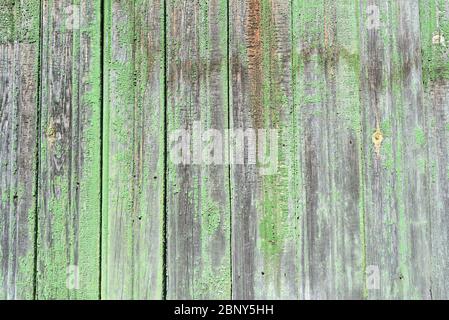 Background. Wooden boards with peeling green paint Stock Photo