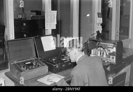 Technician at Yleisradio's information desk in Fabianinkatu radio house,  ca. 1944. by Archives of the Finnish Broadcasting Company Yle Stock Photo -  Alamy