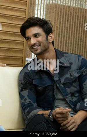 New Delhi, Delhi / India - 08/11/2016: Bollywood actor Sushant Singh Rajput at the trailer launch of MS Dhoni movie at his school with Mahendra Singh Stock Photo