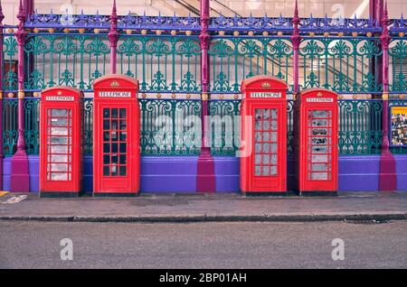 Four Red Telephone Boxes at Grand Ave. Stock Photo