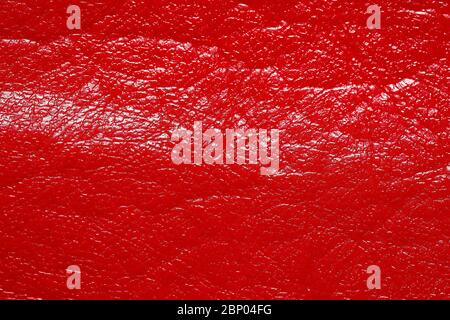 Impressively red leatherette texture. Superlative dark leatherette texture. Stock Photo