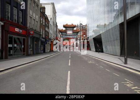 London, UK. 16th May, 2020. Day Fifty Four of Lockdown, in London. Chinatown with very few people around at lunchtime. This is the first weekend of a slight relaxing of lockdown in England as the message from the government is now 'stay alert' instead of 'stay at home'. Now you are able to go out more, play golf, go fishing, and visit garden centres, but social distancing measures should still be maintained. The country has been on lockdown due to the COVID-19 Coronavirus pandemic. COVID-19 Coronavirus lockdown, Peterborough, UK, on May 16, 2020 Credit: Paul Marriott/Alamy Live News Stock Photo