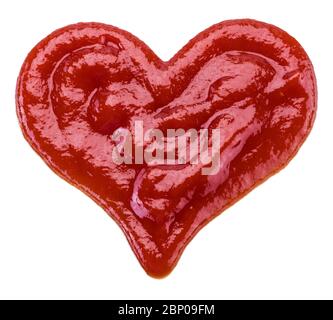 Set of ketchup puddles and ketchup splashes isolated on white background. Stock Photo