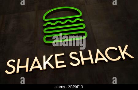 Hong Kong,China:16 May,2020.   US Burger Chain branch sign in Times Square Causeway Bay Hong Kong. Shake Shack is an American fast casual restaurant c Stock Photo