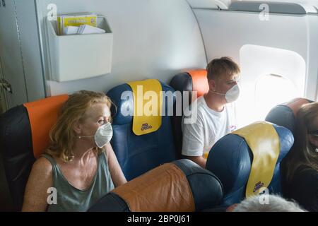 Empty middle seat in a passenger airplane Stock Photo