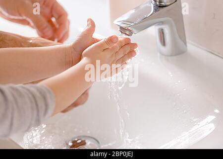 Washing hands rubbing with soap for corona virus prevention Stock Photo