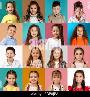 collage of happy smiling faces of kids. Happy child girls and boys expressing different positive emotions. Human emotions, facial expression concept. Stock Photo