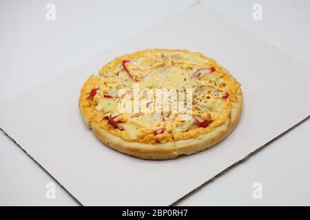 Pizza with chicken and sausage isolated on white background. Stock Photo