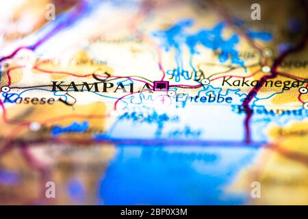 Shallow depth of field focus on geographical map location of Kampala city in Uganda Africa continent on atlas Stock Photo