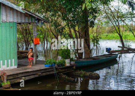 Living on floating houses on the Amazonas River near Manaus, The Amazon, Brazil, Latin Amerika Stock Photo