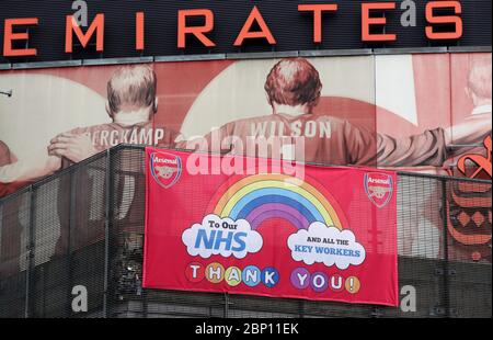 An NHS banner outside Emirates Stadium, home of Arsenal, today should have seen Arsenal take on Watford in what would have been their final Premier League game of the 19/20 season.