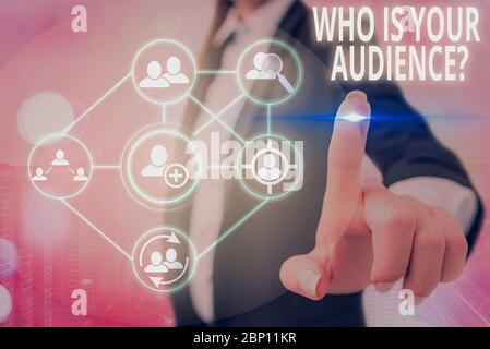 Conceptual hand writing showing Who Is Your Audience Question. Concept meaning who is watching or listening to it Stock Photo