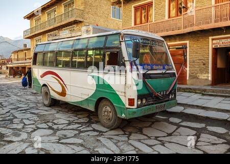 Jomsom, Nepal - November 19, 2016: Bus station in Jomsom. A local bus waiting at station. Stock Photo