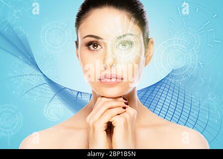 Biometric authentication concept. Facial recognition system of beautiful woman on blue background Stock Photo
