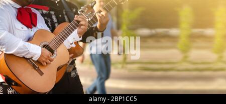 Mexican musician play guitar. Stock Photo
