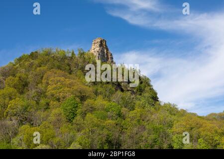 Sugar Loaf - A rock formation on top of a hill during spring. Stock Photo
