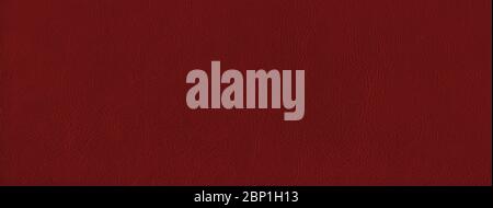 Dark red leather texture background. Natural material banner. Stock Photo