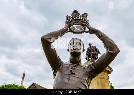 A statue of the character Prince Hal (Henry V) and William Shakespeare on the apex of the Gower Monument, Stratford Upon Avon, England Stock Photo