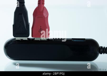 USB multiplexer close-up on white background. It has two usb attached. Close up. Stock Photo